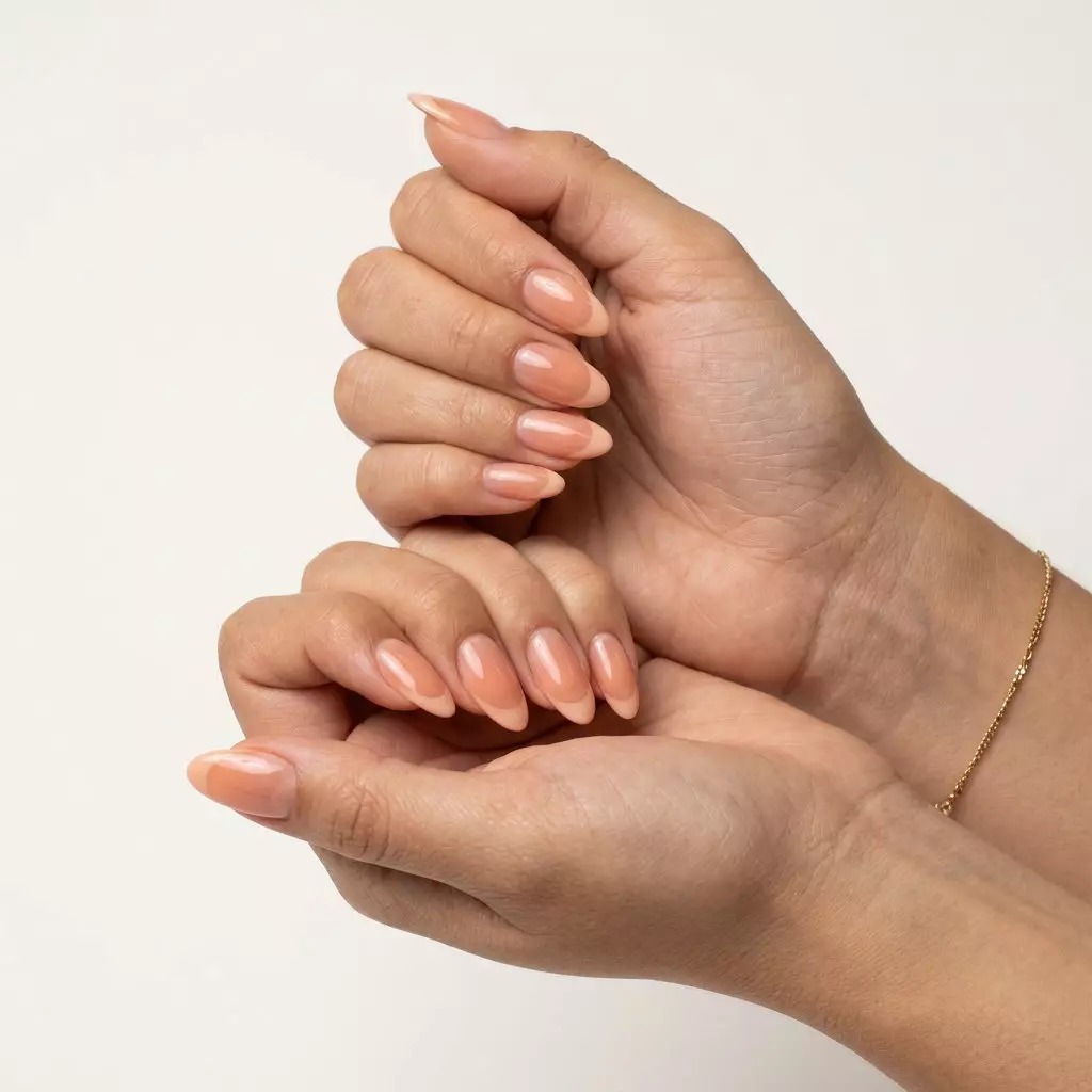 Sheer Peach Jelly French Nails 2026: Beach Day Style Sheer Peach Jelly French nails for trending summer nails 2026. Effortless beach day outfit.