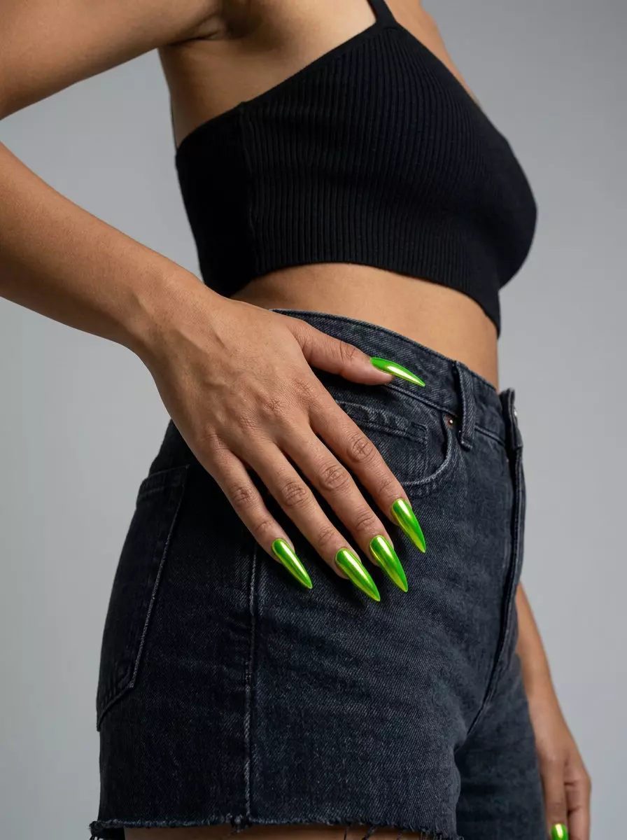 Trendy summer nails 2026: Electric lime green chrome stiletto nails for a bold, futuristic festival look.
