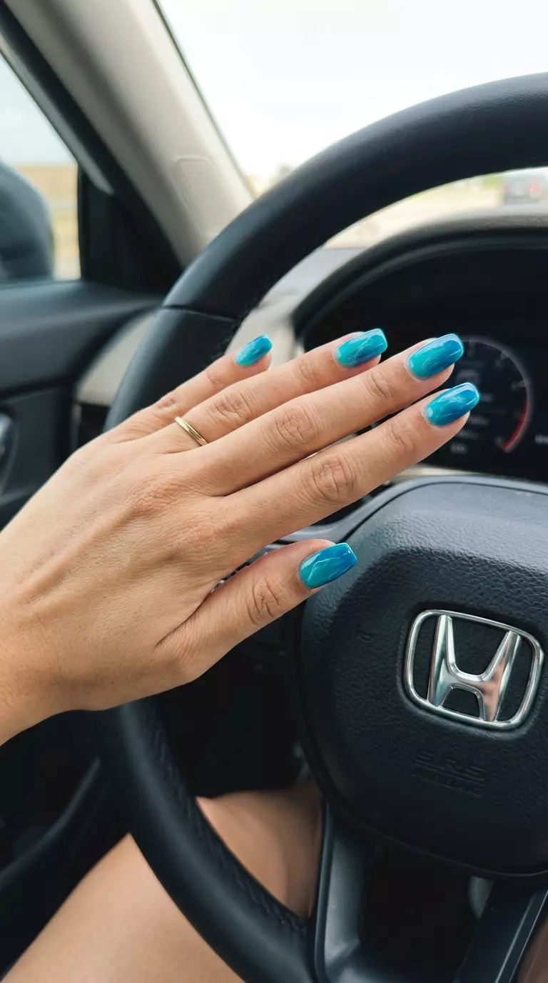 Abstract Wave Ombre Squoval 2026 Clean-girl electric teal to ocean blue ombre squoval nails for tropical nail designs 2026 daily wear.